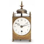 AN EARLY 19th CENTURY FRENCH CAPUCINE CLOCK WITH ALARM the case of typical form surmounted by an urn
