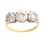 AN 18CT YELLOW GOLD CLAW SET THREE STONE DIAMOND RING total ct weight 3.75, centre stone 1.75ct