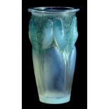 RENE` LALIQUE A GOOD EARLY 20TH CENTURY FRENCH OPALESCENT RELIEF MOULDED GLASS VASE WITH BLUE OVER