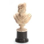A ROMAN MARBLE BUST finely carved, mounted on a marble socle base 38cm high.