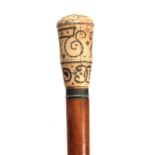 A LATE 17th/ EARLY 18th CENTURY IVORY PIQUEWORK MALACCA WALKING CANE of chunky proportions having