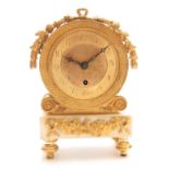 A REGENCY ENGLISH FUSEE BRONZE, ORMOLU, AND WHITE MARBLE MANTLE CLOCK the drum-shaped bronze case