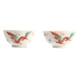 A PAIR OF 18TH / 19TH CENTURY CHINESE PORCELAIN BOWLS decorated with dragons and birds 12cm diameter