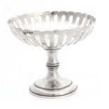 A PIERCED SILVER BONBON DISH - Birmingham 1910 by Walker & Hall 10.5cm diameter 8.5cm high.