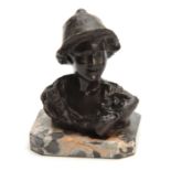 AN ART NOUVEAU BRONZE SCULPTURE depicting the head and shoulders of a young lady; on a clipped