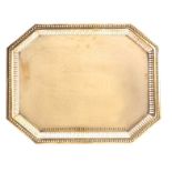 A 19TH CENTURY BRASS ENGRAVED RECTANGULAR TRAY with pierced edge and clipped corners 55cm wide