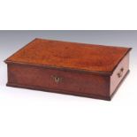 AN EARLY 18TH CENTURY AMBOYNA LACE BOX with hinged moulded edge veneered top and solid sides, fitted
