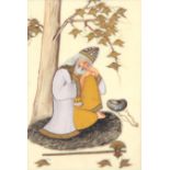 A LATE19TH/EARLY20TH CENTURY PERSIAN FRAMED IVORINE PANEL OF A DERVISH finely painted resting