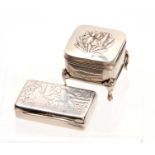 AN ART NOUVEAU SILVER EMBOSSED LIDDED BOX having a stylish lily design to the hinged lid supported