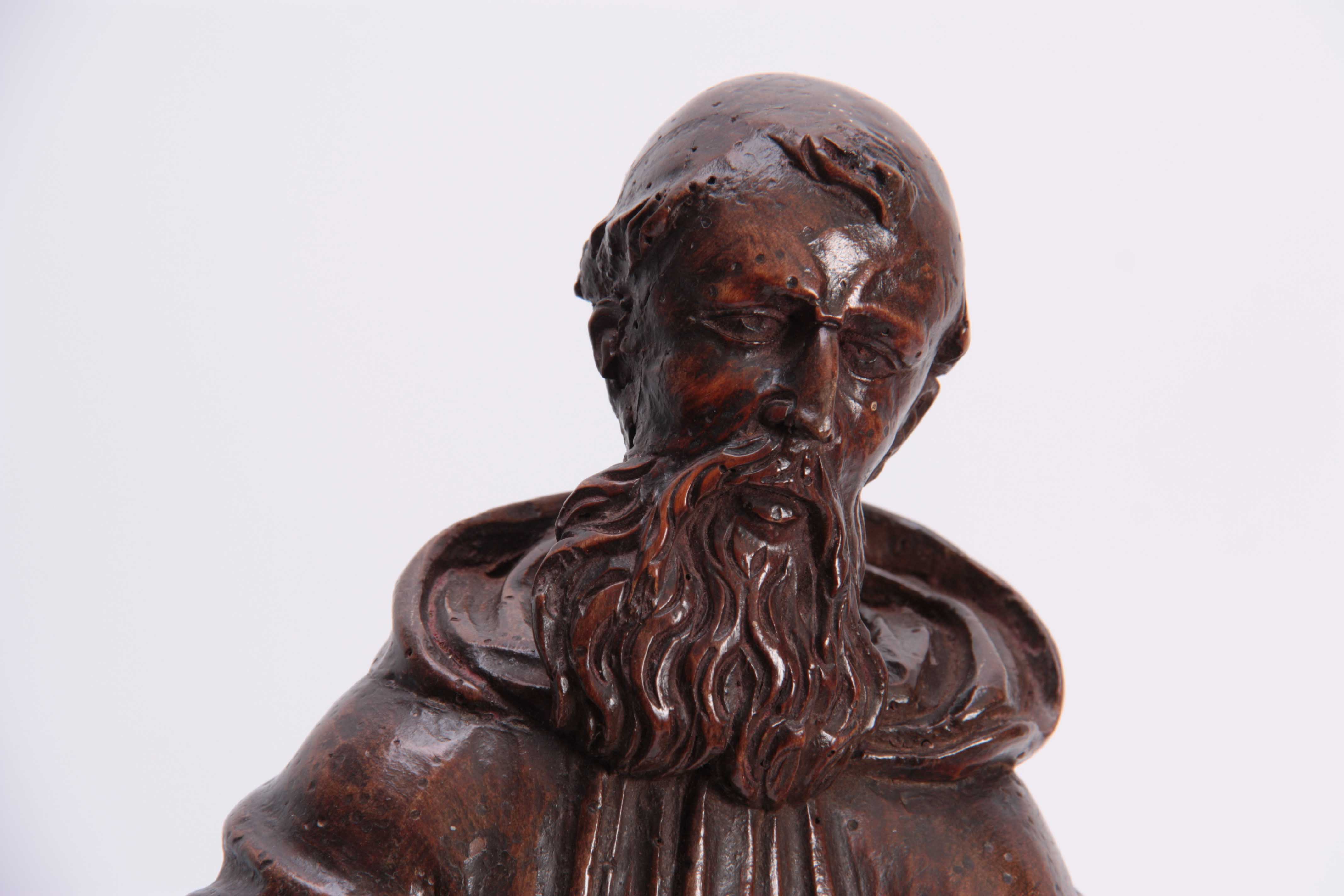 A 17TH CENTURY CARVED LIMEWOOD FIGURE OF A SAINT finely carved with a good patination 48cm high. - Image 2 of 5