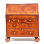 A GOOD WILLIAM AND MARY HERRING-BANDED AND BURR WALNUT BUREAU having angled hinged fall revealing