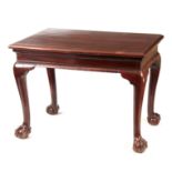 A GEORGE II IRISH MAHOGANY CONSOLE TABLE with shaped shallow frieze; standing on bulbous shaped