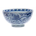 AN 18th/19th CENTURY CHINESE BLUE AND WHITE DEEP FOOTED BOWL bearing KANGXI marks with cavorting
