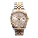 A GENTLEMAN'S BIMETAL ROLEX DATEJUST WRISTWATCH the oyster case with fixed fluted bezel enclosing