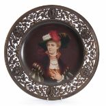 A 19THCENTURY CONTINENTAL PORCELAIN PORTRAIT PLAQUE WITH BRONZED METAL MOUNT finely painted with a