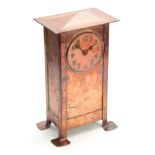 A NICE QUALITY ARTS AND CRAFTS COPPER MANTEL CLOCK WITH RUSKIN DIAL in the manner of Richard