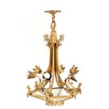 AN EARLY 20TH CENTURY BRASS ORMOLU CHANDELIER / CEILING LIGHT having six leaf cast light fittings