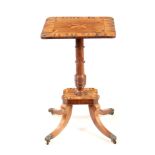 A REGENCY ROSEWOOD AND SPECIMEN TIMBER CROSS-BANDED TILT TOP OCCASIONAL TABLE with star inlaid