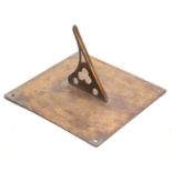 A SQUARE BRASS SUNDIAL dated 1671, having engraved verses around the edges 'As day runs So your