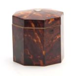 A 19TH CENTURY TORTOISESHELL VENEERED OCTAGONAL SHAPED TEA CADDY with silver wire edges having a