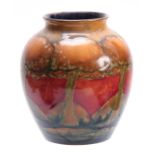 AN EARLY 20th CENTURY WILLIAM MOORCROFT EVENTIDE VASE decorated with six trees, signed and impressed