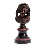 A LATE 19TH CENTURY FRENCH BRONZE BUST OF A YOUNG GIRL mounted on a turned marble and slate soccle