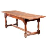 A GOOD LATE 17TH CENTURY OAK REFECTORY / FARMHOUSE TABLE with one-piece plank top, above a plain