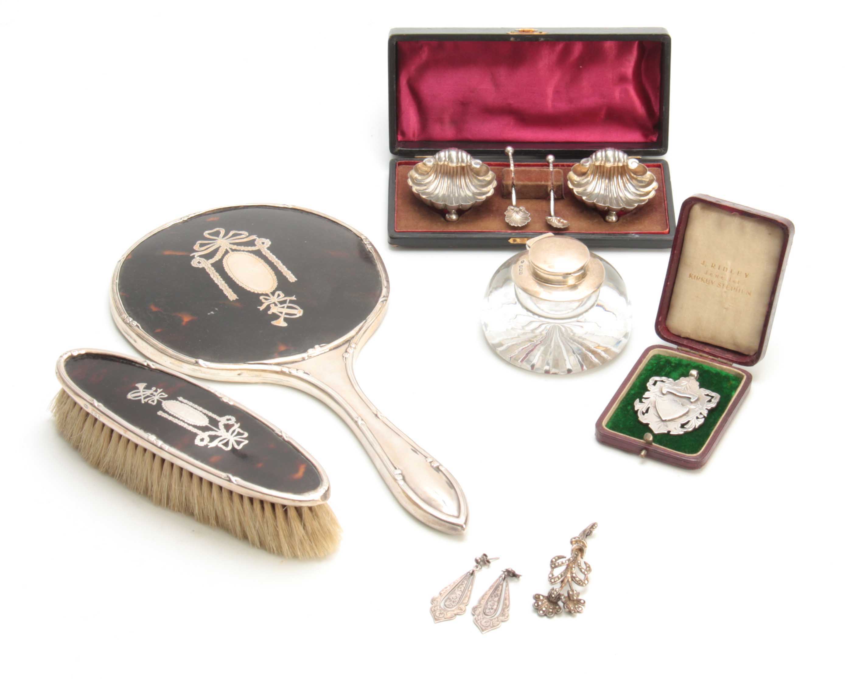 A SELECTION OF SILVER ITEMS INCLUDING a Dressing table Mirror, Sheild Pendant, Dressing Table Brush,