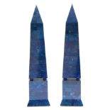 A PAIR OF 20TH CENTURY LAPIS LAZULI OBELISKS with brick effect veneered stone, having split