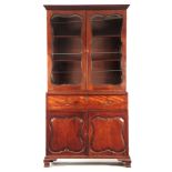 A GEORGE II MAHOGANY SECRETAIRE BOOKCASE IN THE MANER OF GILES GRENDEY having a moulded outset