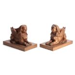 A PAIR OF BRONZED SPHINX ON PLINTH BASES, 39.5cm long, 21cm wide.