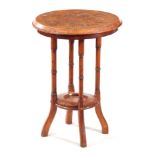 AN EARLY 20TH CENTURY NEW ZEALAND PARQUETRY INLAID OCCASIONAL TABLE IN THE MANER OF WILLIAM NORRIE