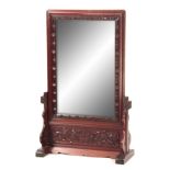 A 19TH CENTURY CHINESE HARDWOOD TABLE MIRROR / SCREEN having moulded pierced frame surrounding a