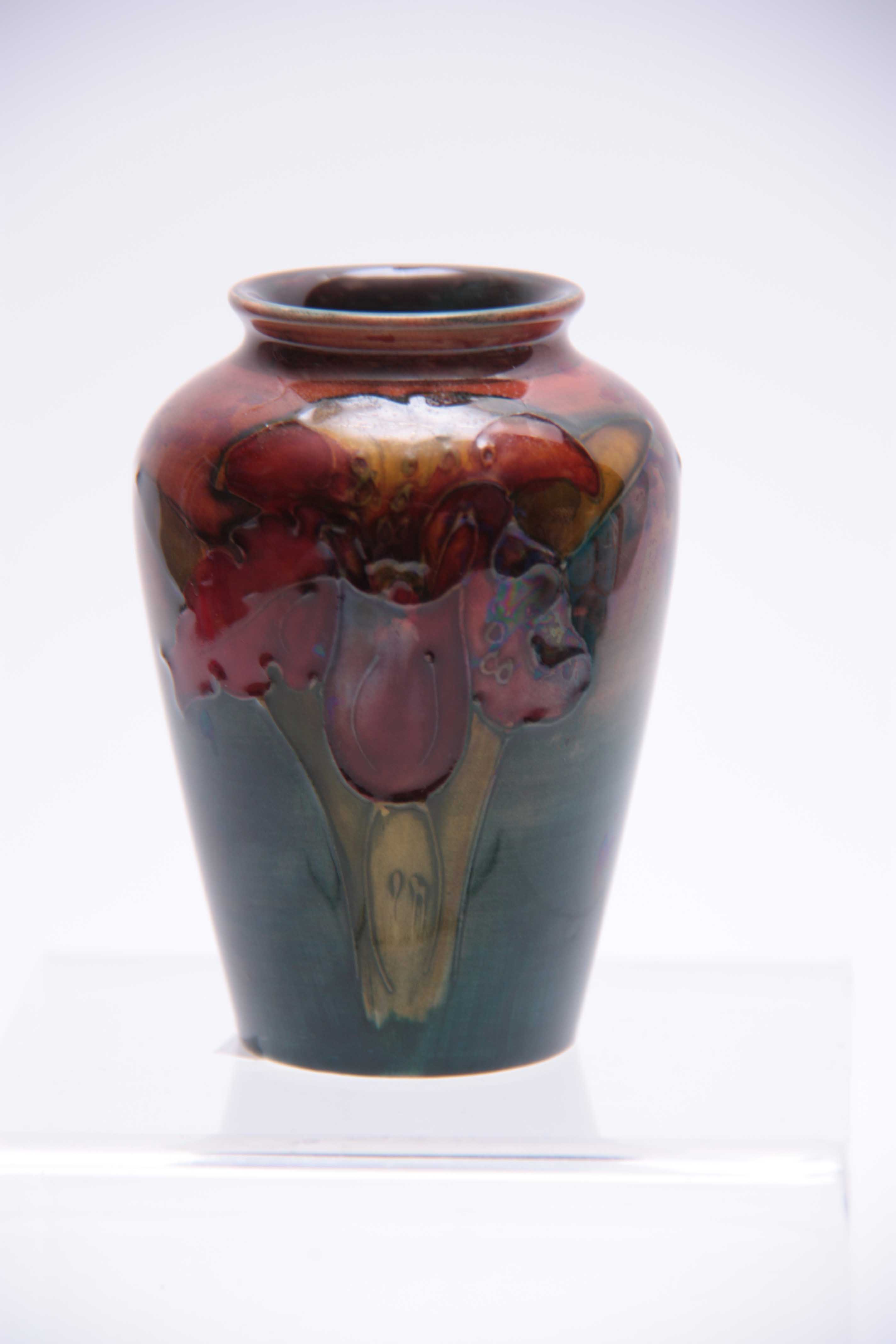 A SMALL 20TH CENTURY FLAMBE MOORCROFT VASE decorated with orchids 9cm high. - Image 2 of 3