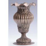 A LARGE ART NOUVEAU STYLE CONTINENTAL SILVER VASE with leaf cast rim and bulbous body standing on