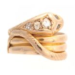 A 15CT YELLOW GOLD COILED SNAKESHEAD RING set with three tapering diamonds to the head and eyes