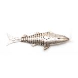 A SILVER RETICULATED FISH 9.5cm overall