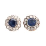 A PAIR OF YELLOW GOLD DIAMOND AND SAPPHIRE SET FLOWERHEAD EAR STUDS