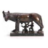 A 19TH CENTURY BRONZE SCULPTURE OF ROMULUS AND REMUS WITH THE SHE WOLF having a rich brown patina