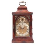 RIEDER & CO, LONDON A GEORGE III FIGURED MAHOGANY BRACKET CLOCK the bell top pediment above a glazed