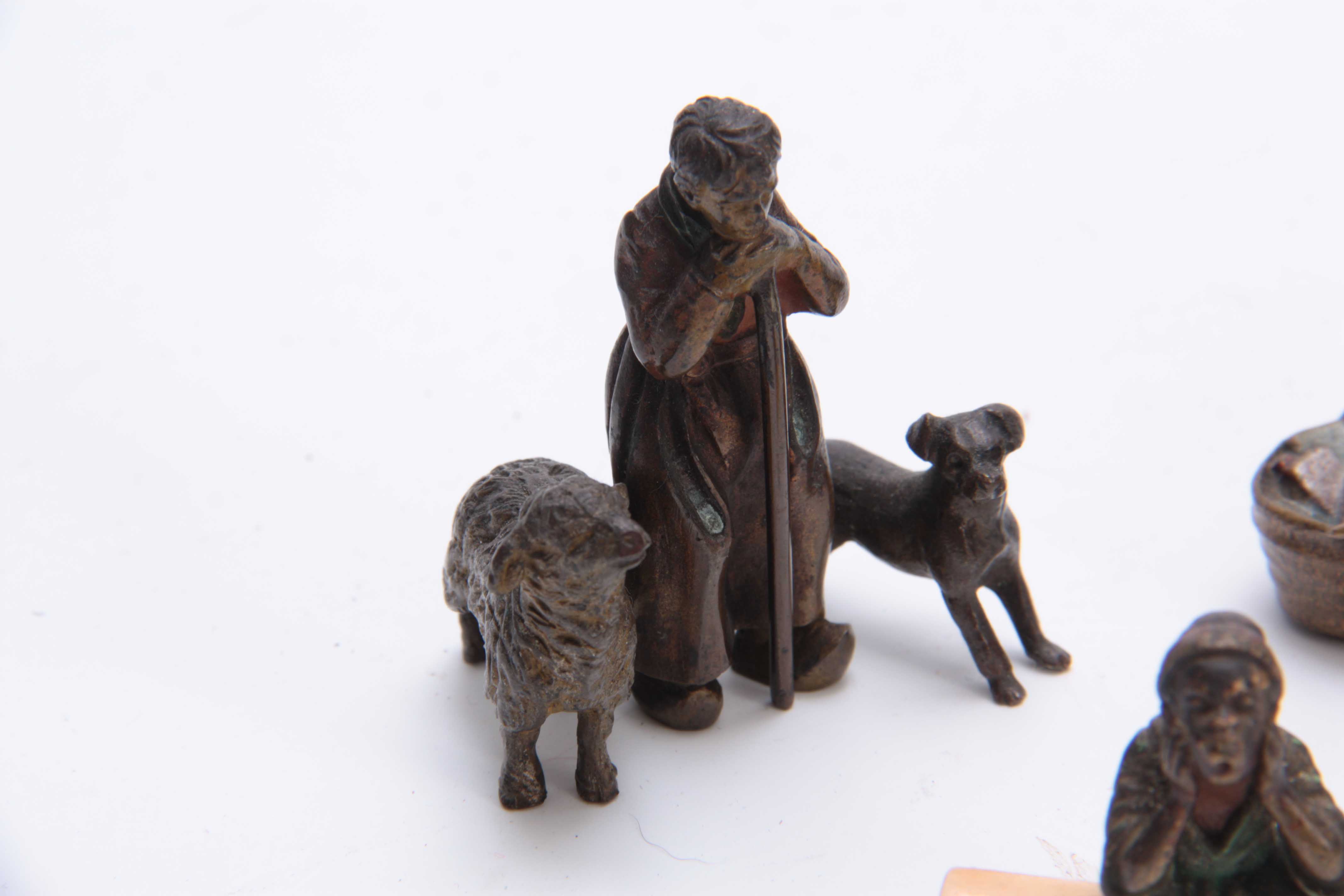 A COLLECTION OF THREE EARLY 20th CENTURY COLD PAINTED BRONZE FIGURES modelled as an Arab bookseller, - Image 3 of 5