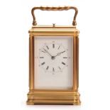 DROCOURT, PARIS. A LATE 19th CENTURY FRENCH BRASS GORGE CASED REPEATING CARRIAGE CLOCK having a gilt