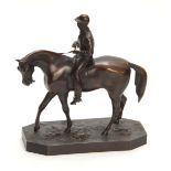 A LATE 19th CENTURY PATINATED BRONZE SCULPTURE modelled as a jockey and horse on naturalistic base