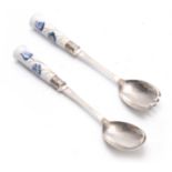 A PAIR OF SILVER PLATED MACINTYRE MOORCROFT FLORIANWARE SALAD SERVERS with blue flower and leaf