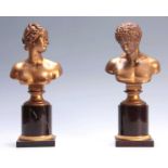 A PAIR OF 19TH CENTURY FRENCH EMPIRE CLASSICAL GILT BRONZE BUSTS OF AN EMPEROR AND EMPRESS on a