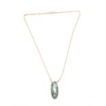 A .375 HALLMARKED YELLOW GOLD SLENDER NECK CHAIN AND LARGE OVAL TURQUOISE PENDANT 49.5cm long