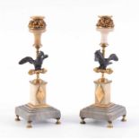 A PAIR OF 19TH CENTURY FRENCH BRONZE, ORMOLU AND MARBLE CANDLESTICKS with square bases and winged
