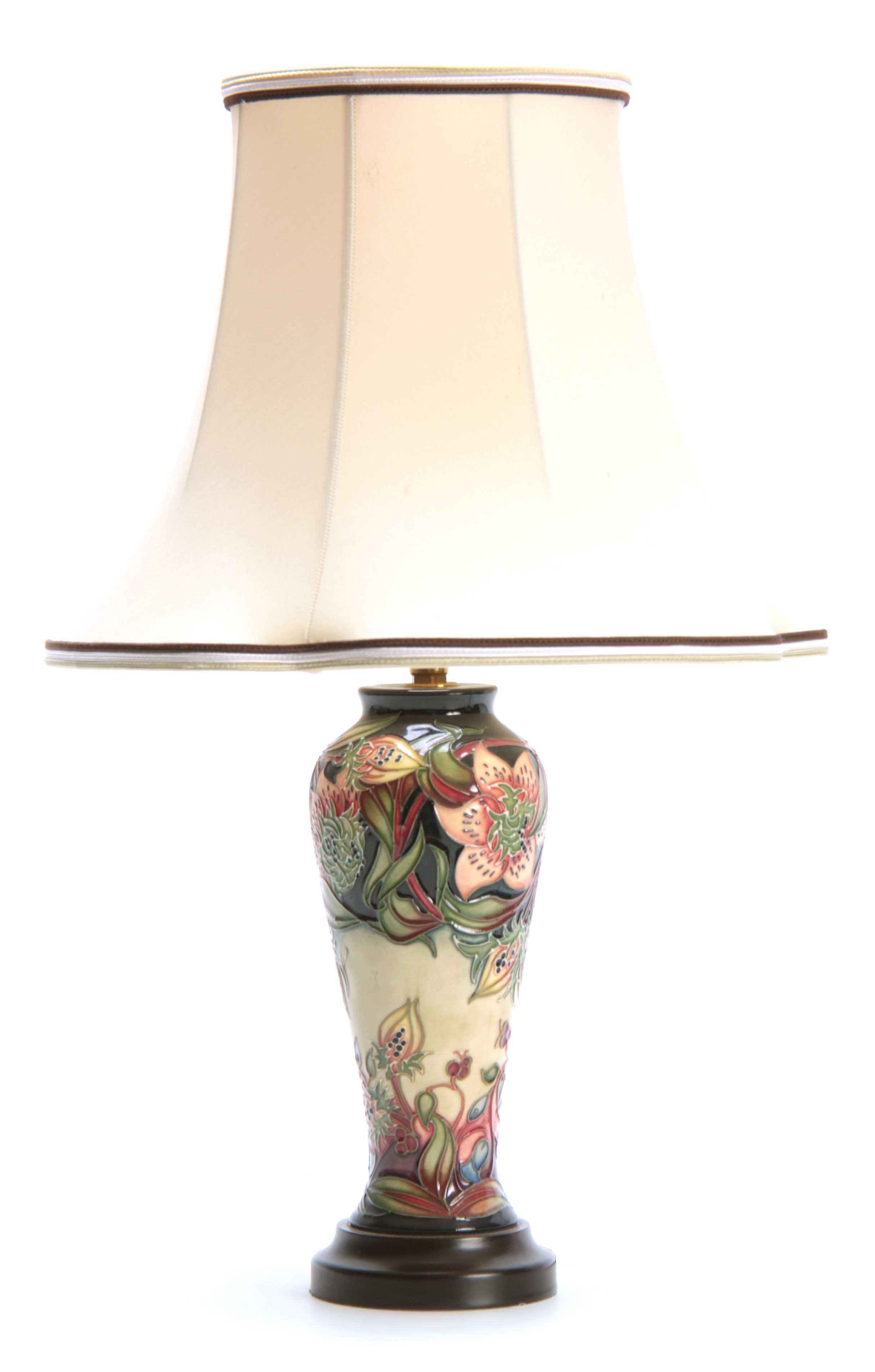 A MODERN MOORCROFT TABLE LAMP with colourful tube lined flower decoration 47cn high to top of the