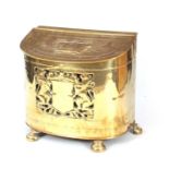 A 19TH CENTURY BOW FRONTED BRASS COAL BOX with a pressed crown to the lid and coat of arms to the