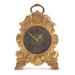 E. THOMAS, PARIS A LATE 19th CENTURY FRENCH GILT TRAVELLING CLOCK the foliate engraved case